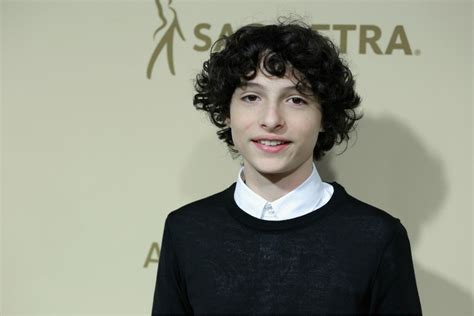 finn wolfhard 14 years old.